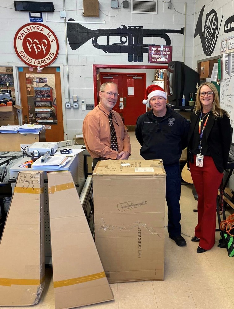 MOORE, ERICKSON & Sabo with guitar donation in Band Room at PHS